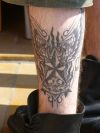 scull tattoo on leg